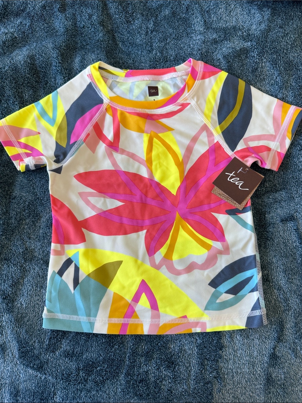 Tea Collection Girls' Floral Short Sleeve Rash Guard - Pink, Yellow, Blue